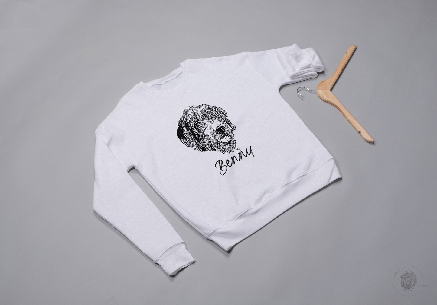 custom pet portrait on eco friendly products. Fashion for petlovers, unique to your individual pet. Sustainable, organic cotton, certified. Elmojis turns your pet into sketched portraits. Whether you choose a unisex or kids T-shirt or sweatshirt, a mug, tote, pouch or waterbottle - these pet portraits are more than just an emoji.